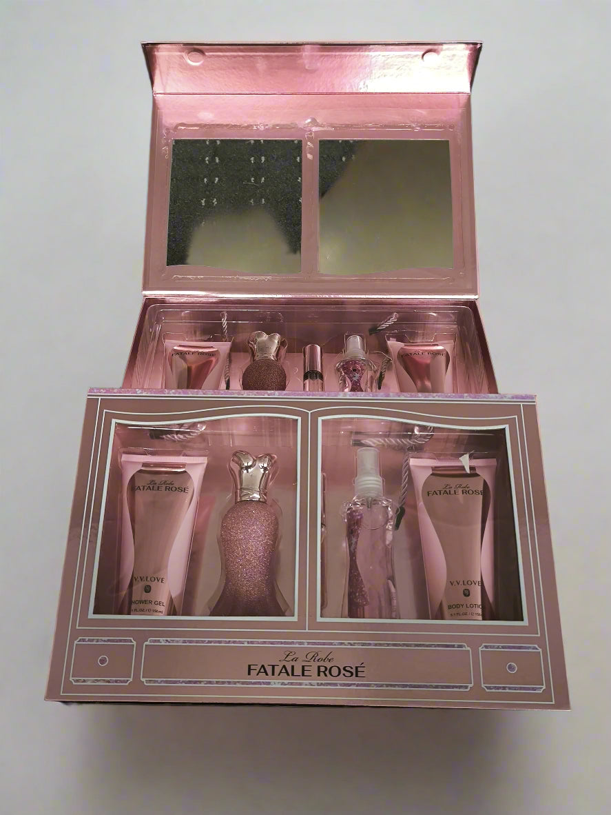 Pink cosmetic set with 'La Riche Fatale Rose' branding on a black textured background
