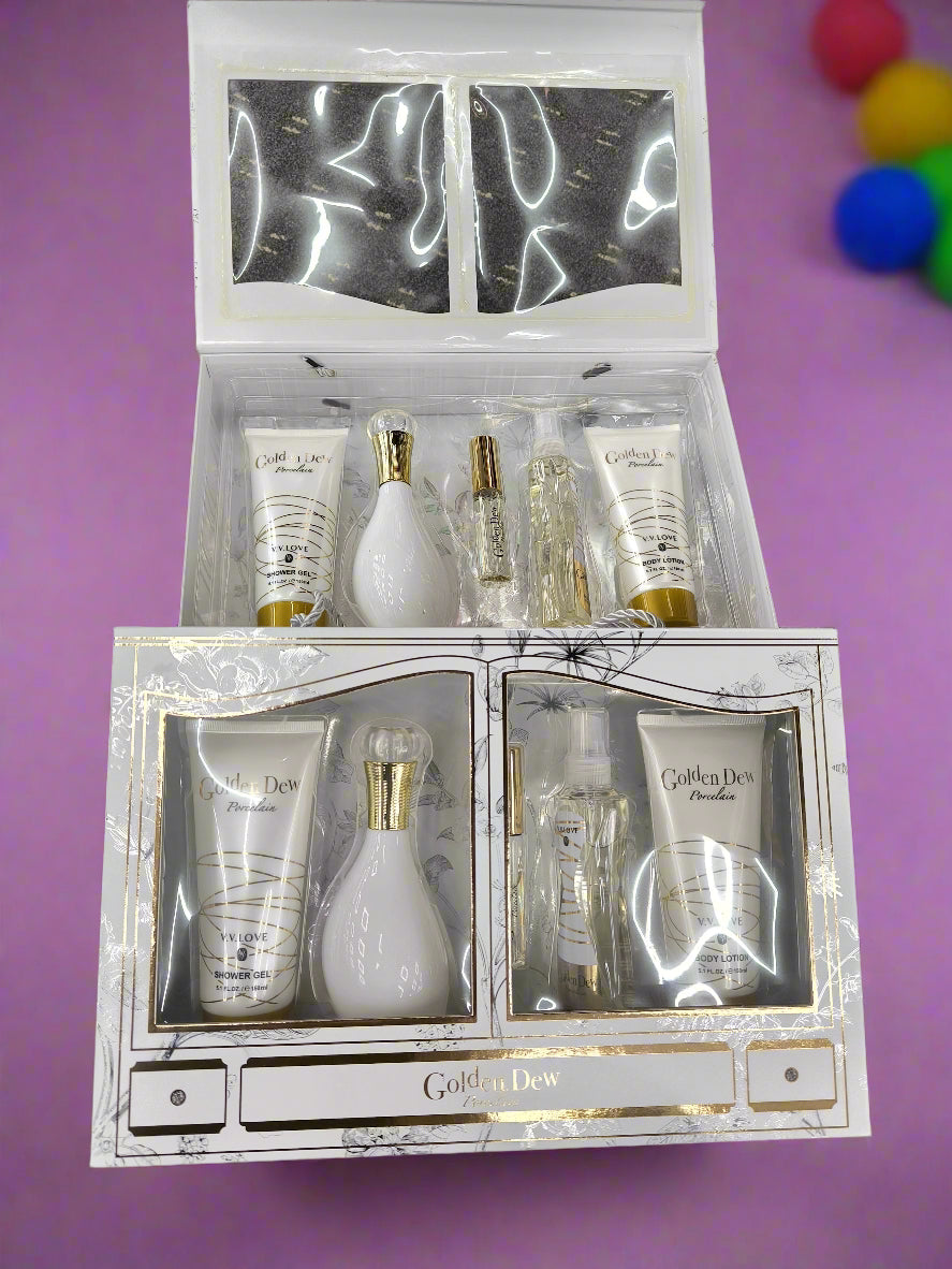 Set of skincare products in a decorative box on a textured surface