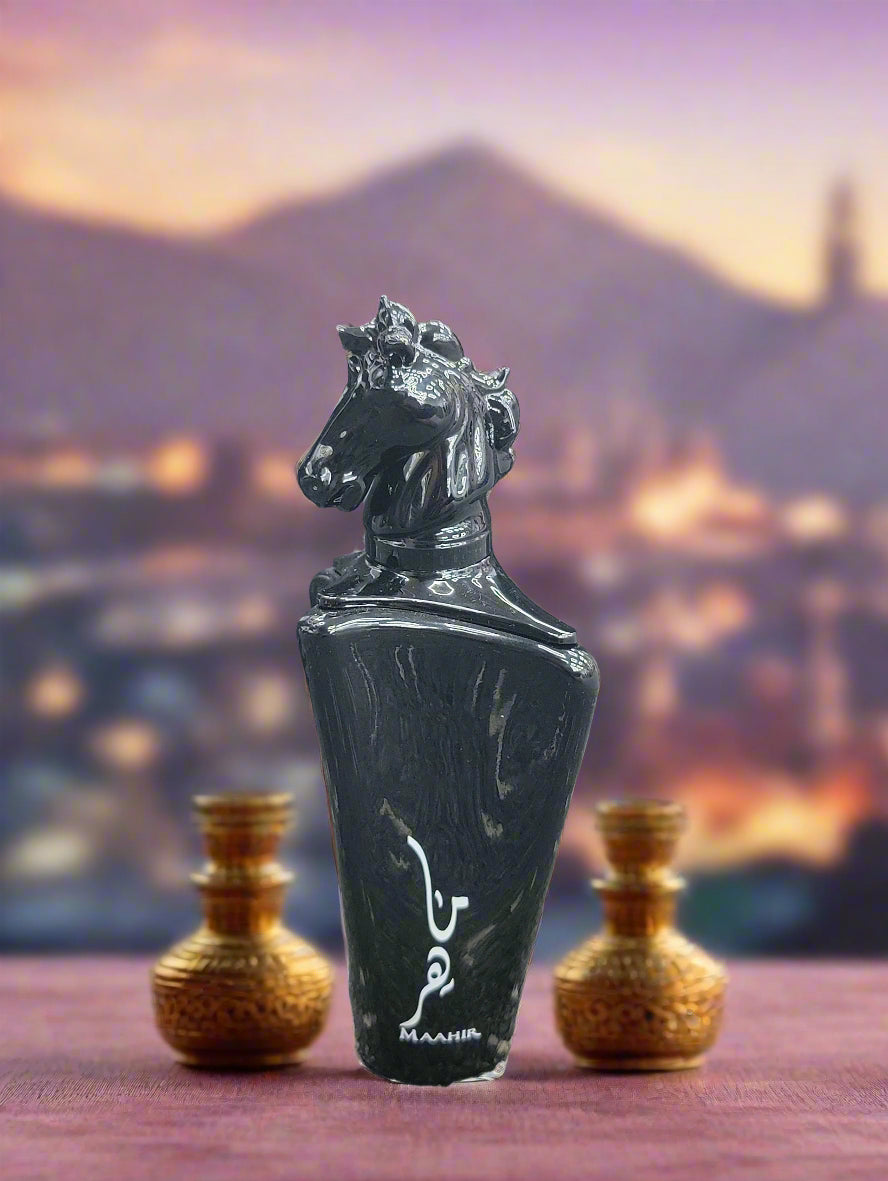 Black perfume bottle with horse design on top, branded 'MAAHR', against a dark background.