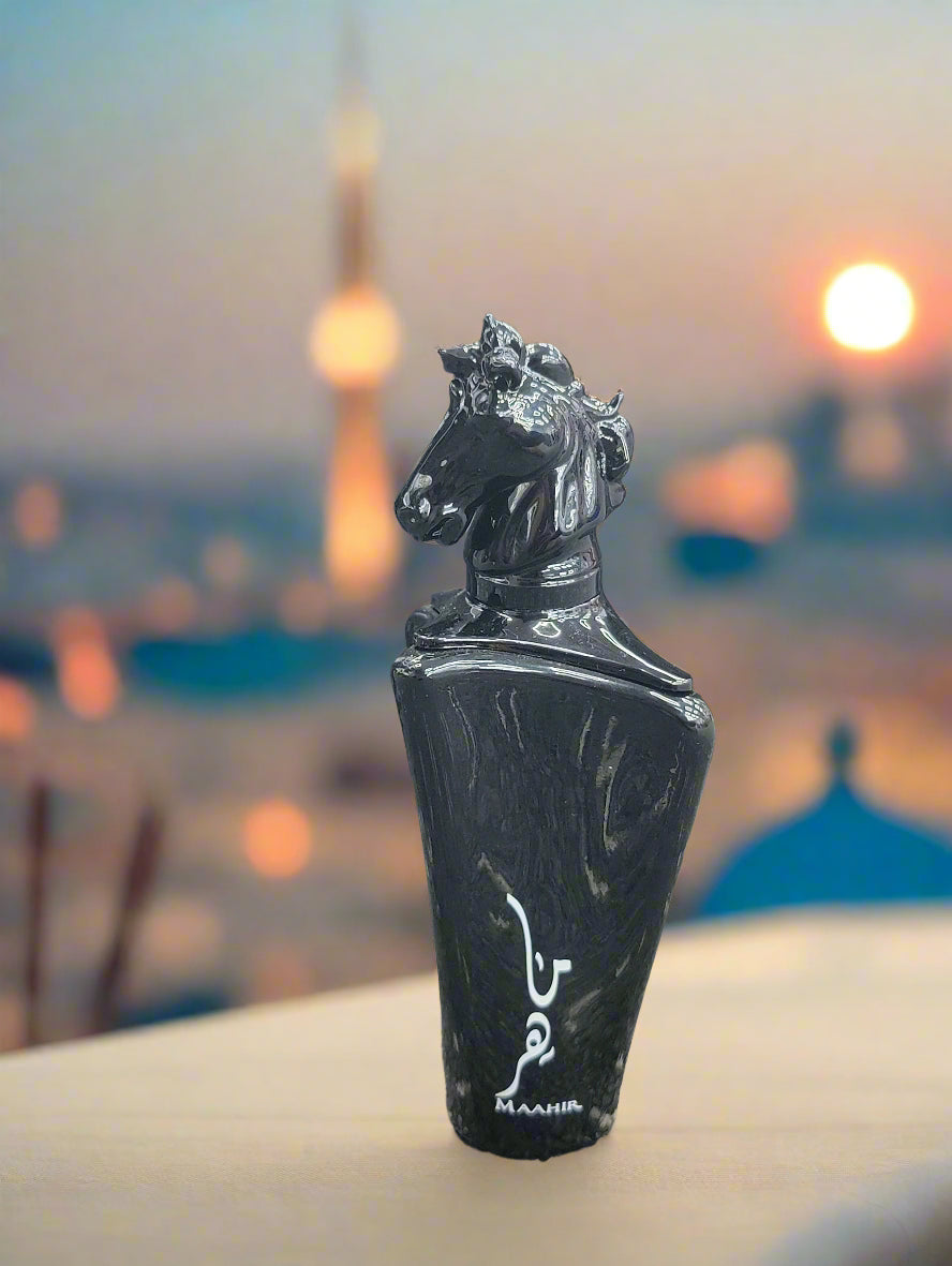 Black perfume bottle with horse design on top, against a dark background