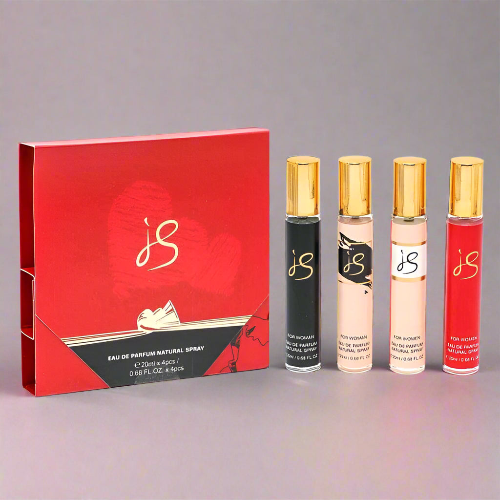 Set of four perfume bottles with gold caps and a red packaging box featuring a logo.