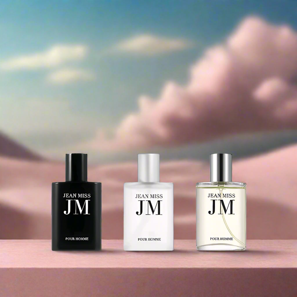 Three Jean Miss perfume bottles with a blue background