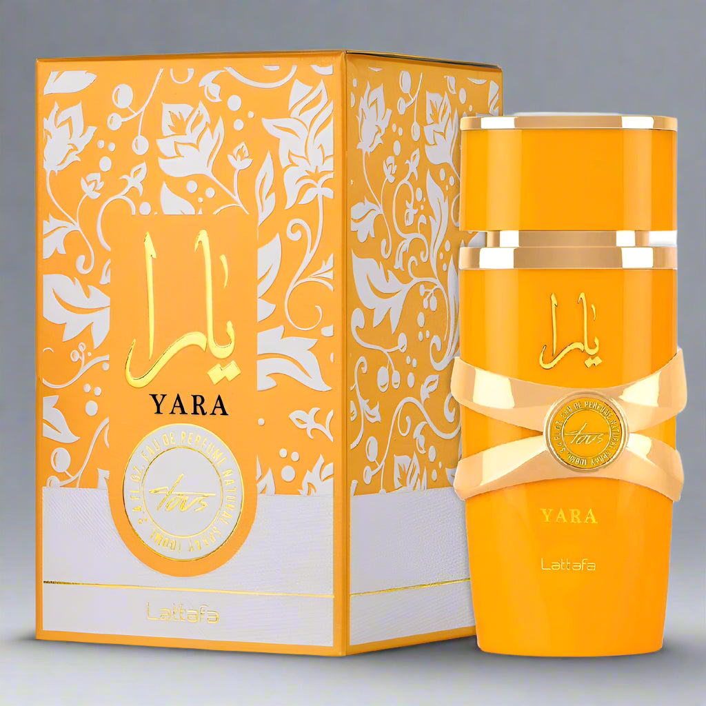 Orange Yara perfume bottle and packaging with intricate designs on a white background