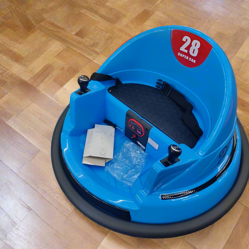Blue bumper car with number 28 on a gray floor
