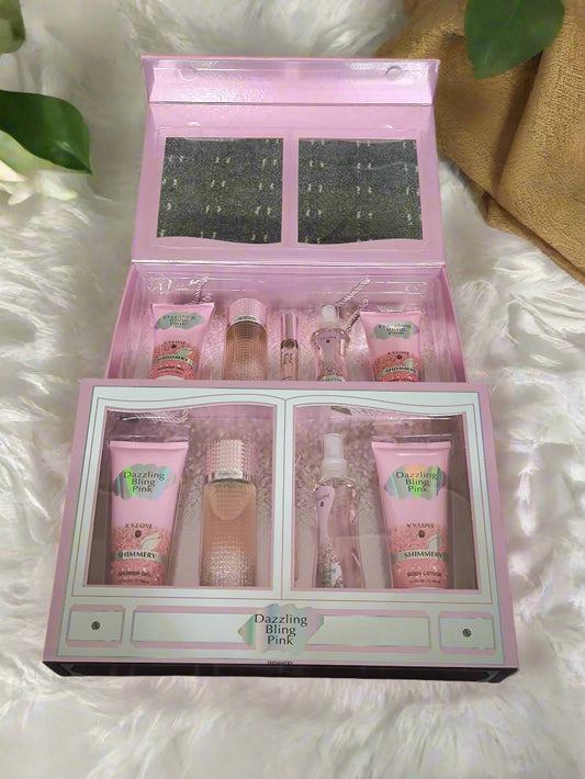 Pink cosmetic set with 'Darling Bump Pink' branding on a textured black surface