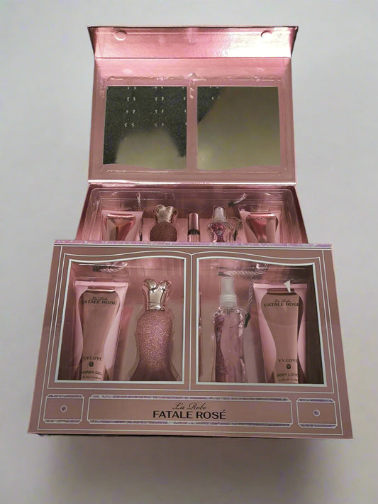 Pink cosmetic set with 'La Riche Fatale Rose' branding on a black textured background