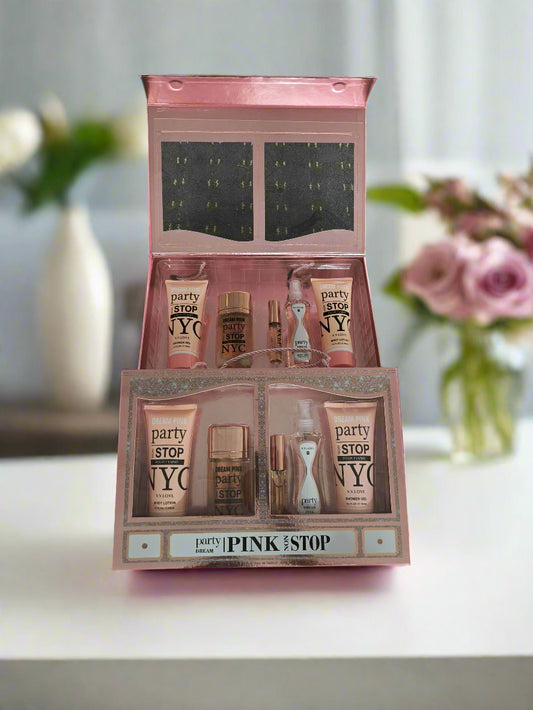 Makeup set with 'party pink stop' branding on a textured black surface