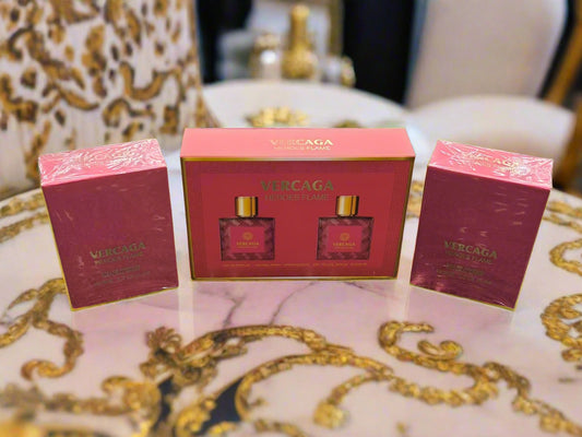 Three red boxes with 'Versace' branding on a textured surface