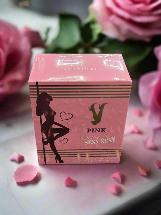 Pink box with silhouette design on a textured gray surface
