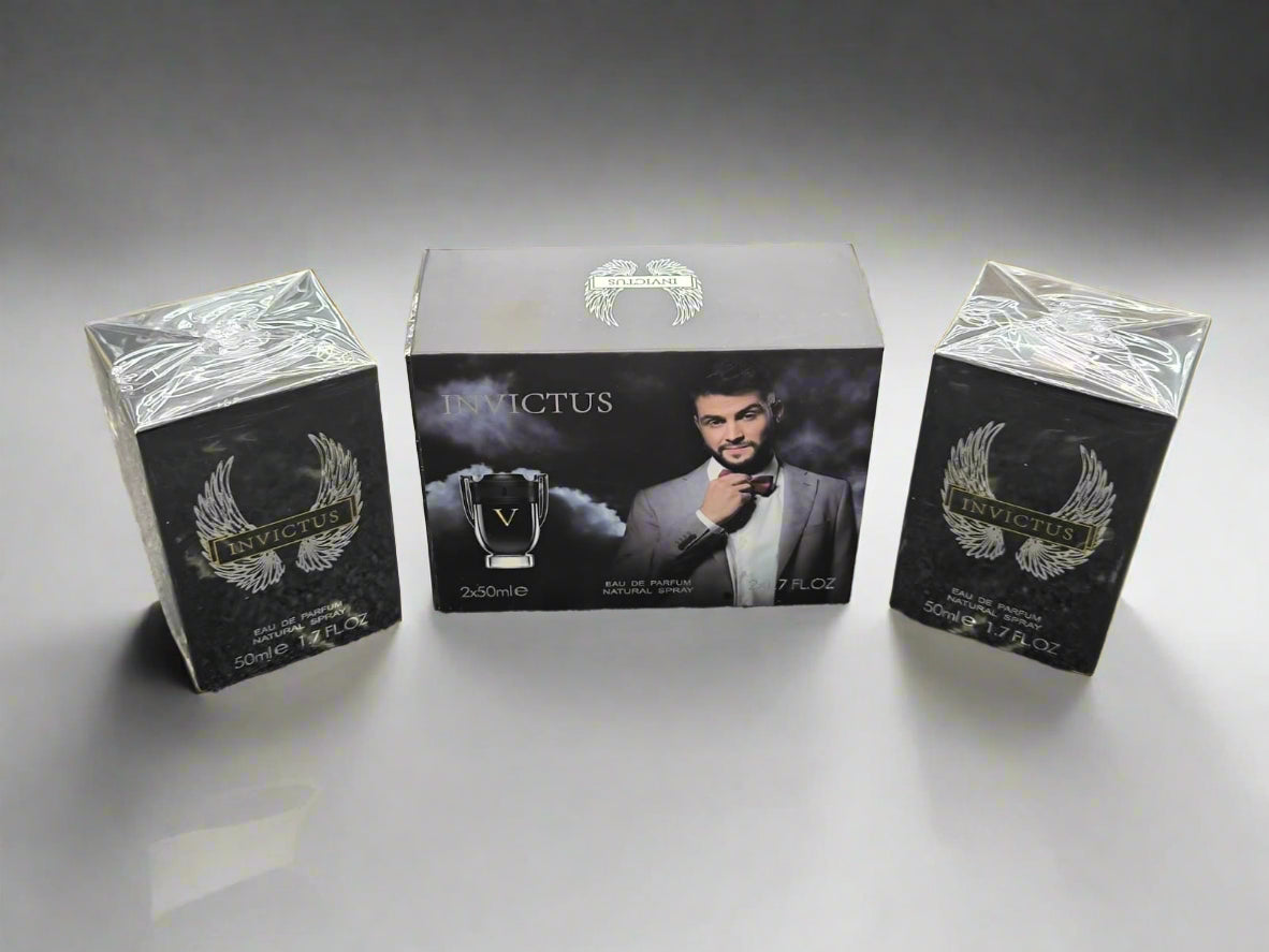 Invictus perfume packaging on a textured surface