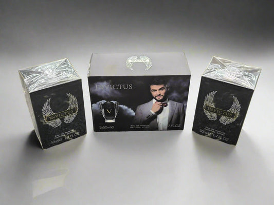 Invictus perfume packaging on a textured surface