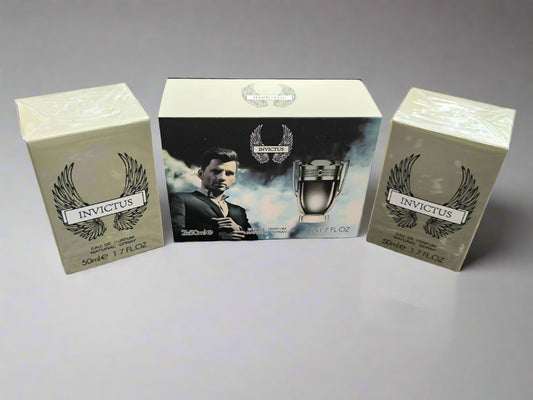 Invictus perfume packaging set on a textured surface