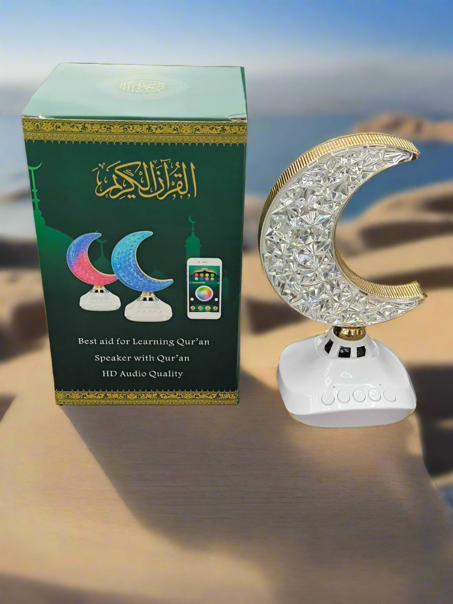 Decorative lamp shaped like a crescent moon with packaging on a gray background