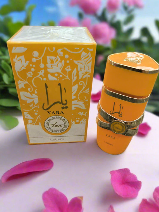 Yara perfume bottle and box on a textured surface