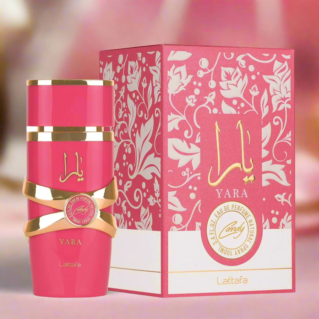 Pink Lattafa Yara perfume bottle and packaging on a white background