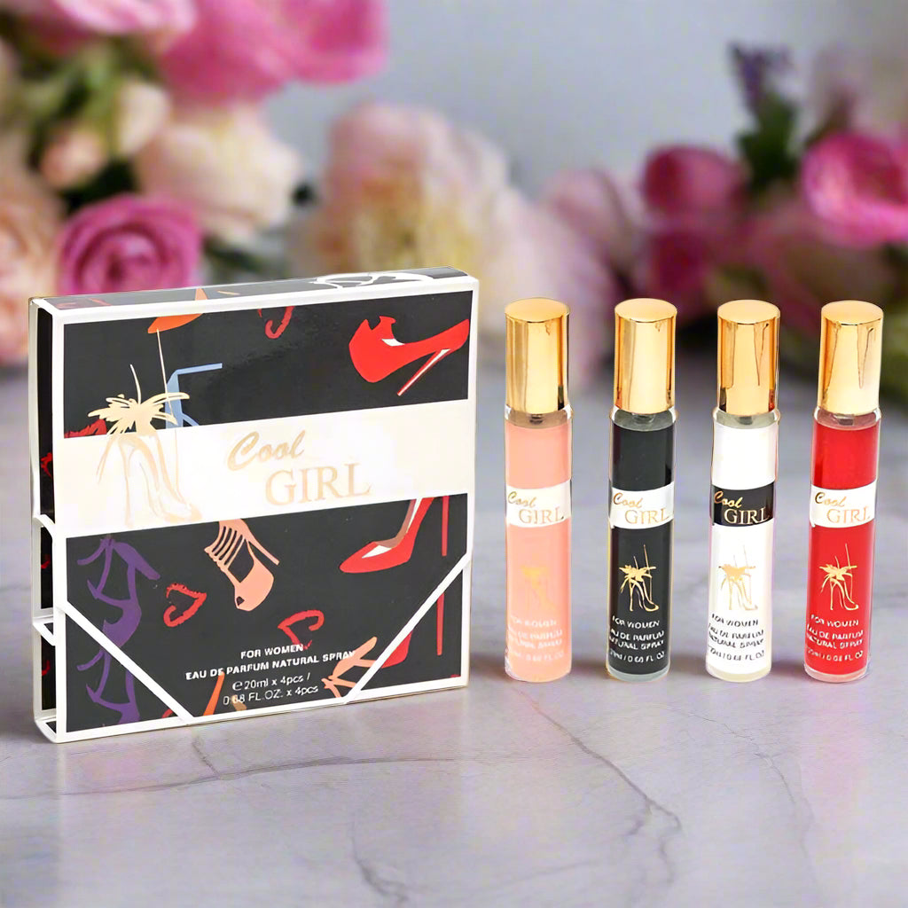 Set of 'Cool Girl' perfume bottles with packaging on a white background