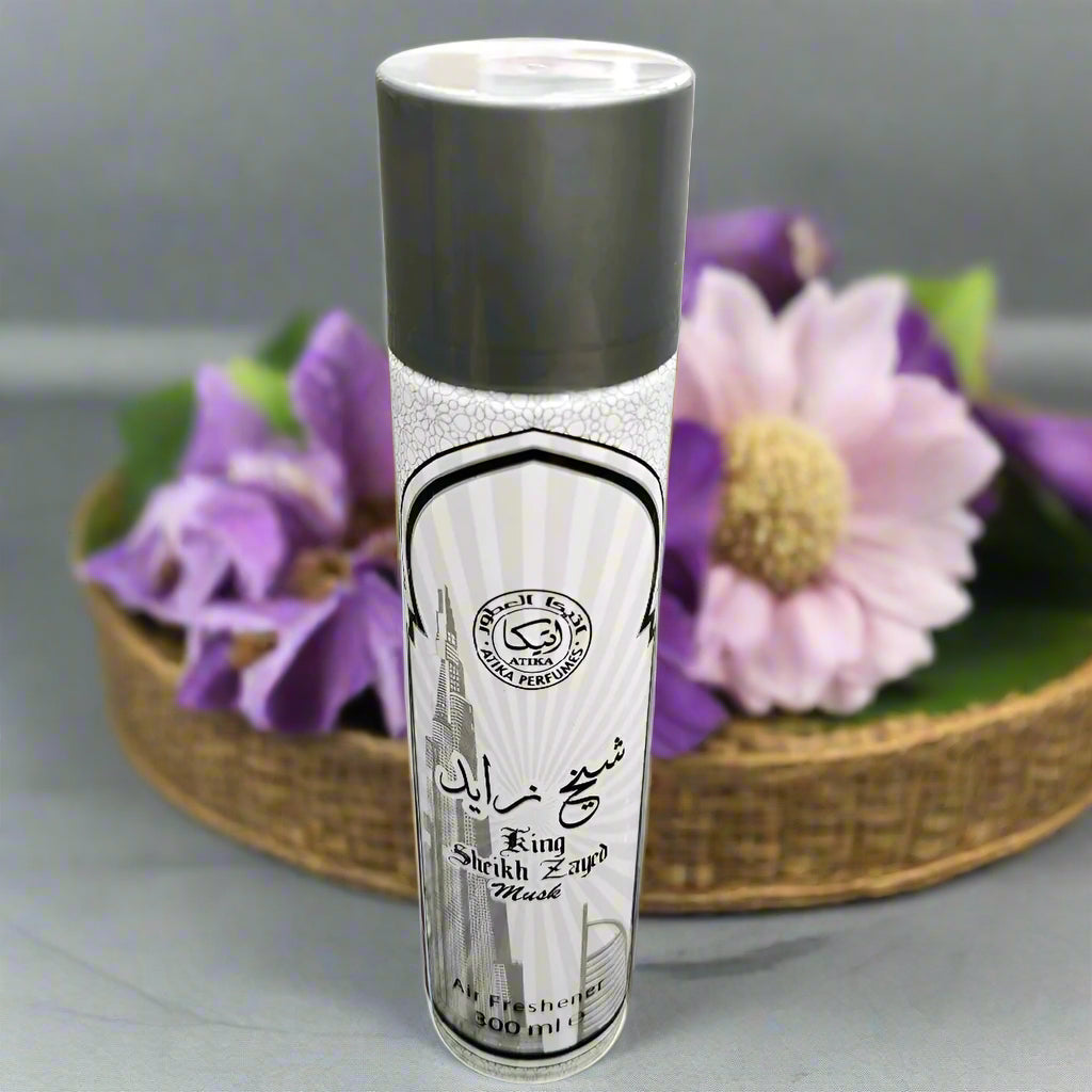 Perfume bottle with a label on a textured gray surface